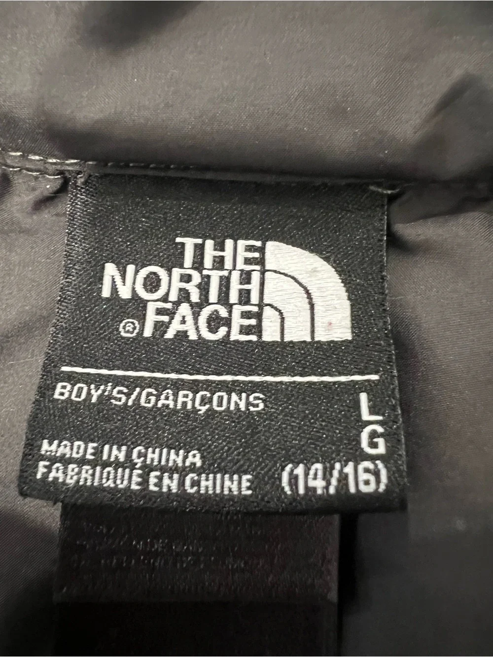The North Face Black Puffer Jacket with Neon Green Trim boys 14-16